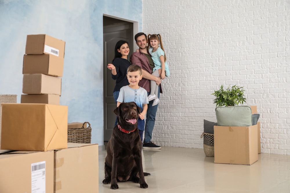 Happy Family Moving Into Their New Home — Caloundra Removals & Storage in Sunshine Coast, QLD