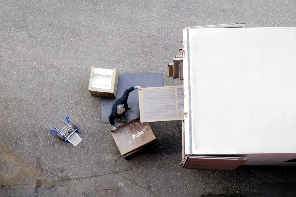 Loading Furniture Into Removalist Truck — Caloundra Removals & Storage in Sunshine Coast, QLD