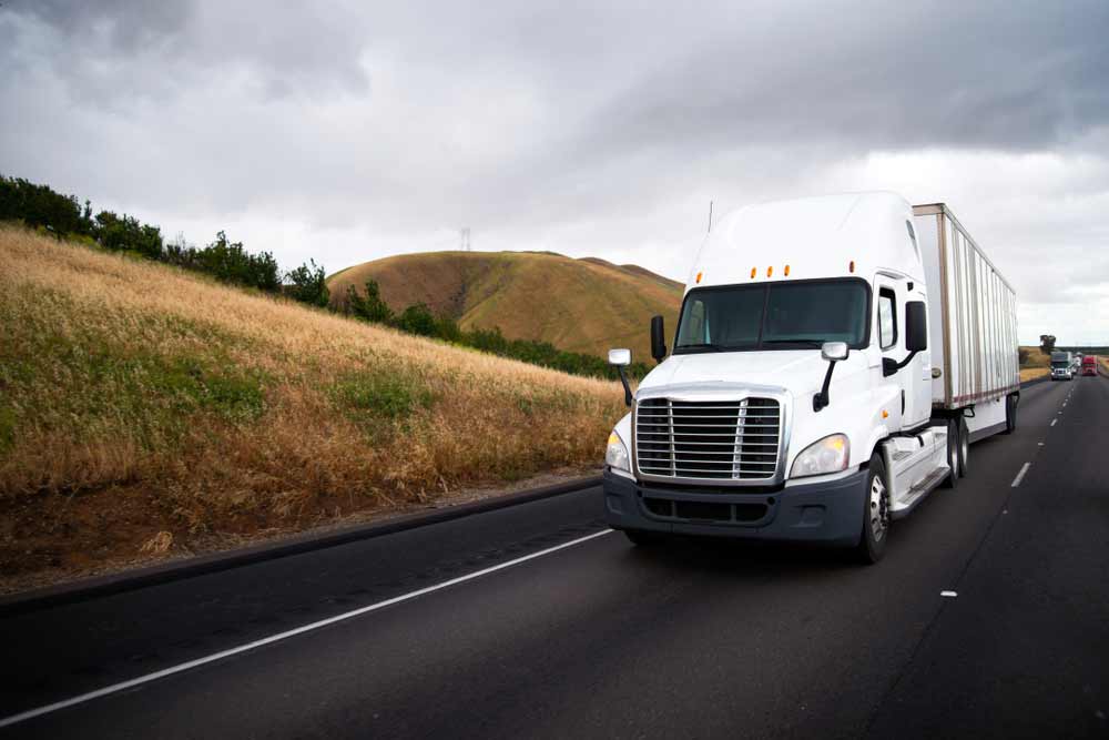 Interstate removalist expertly driving a semi-truck for efficient removal service