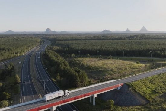 Truck Travelling On Highway Bridge — Caloundra Removals & Storage in Sunshine Coast, QLD