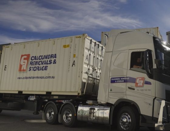 Side View Of Parked Truck At Warehouse — Caloundra Removals & Storage in Sunshine Coast, QLD