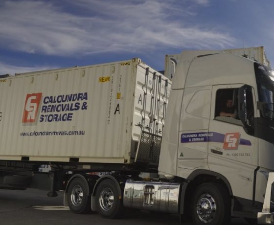 Side View Of Parked Truck At Warehouse — Caloundra Removals & Storage in Sunshine Coast, QLD